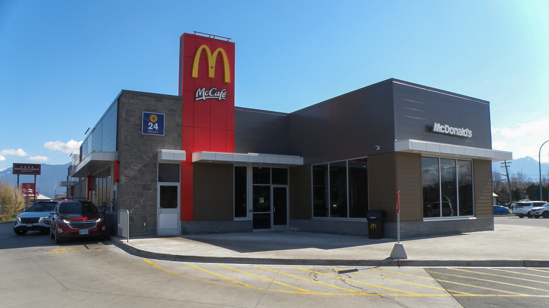 The exterior of a McDonalds restaurant showing the drive thru